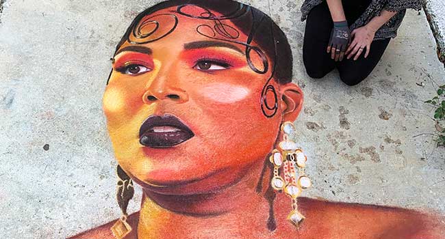 Chalk image of Lizzo for Black History Month